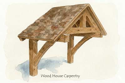 Hand-crafted timber framed bracket porch roof for a side door entrance.