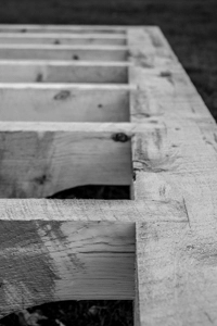 Timber framed floor joints in beam
