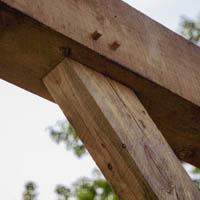 timber framed knee brace on western arch